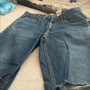 Women’s Skinny Jeans in Distressed Mid Blue